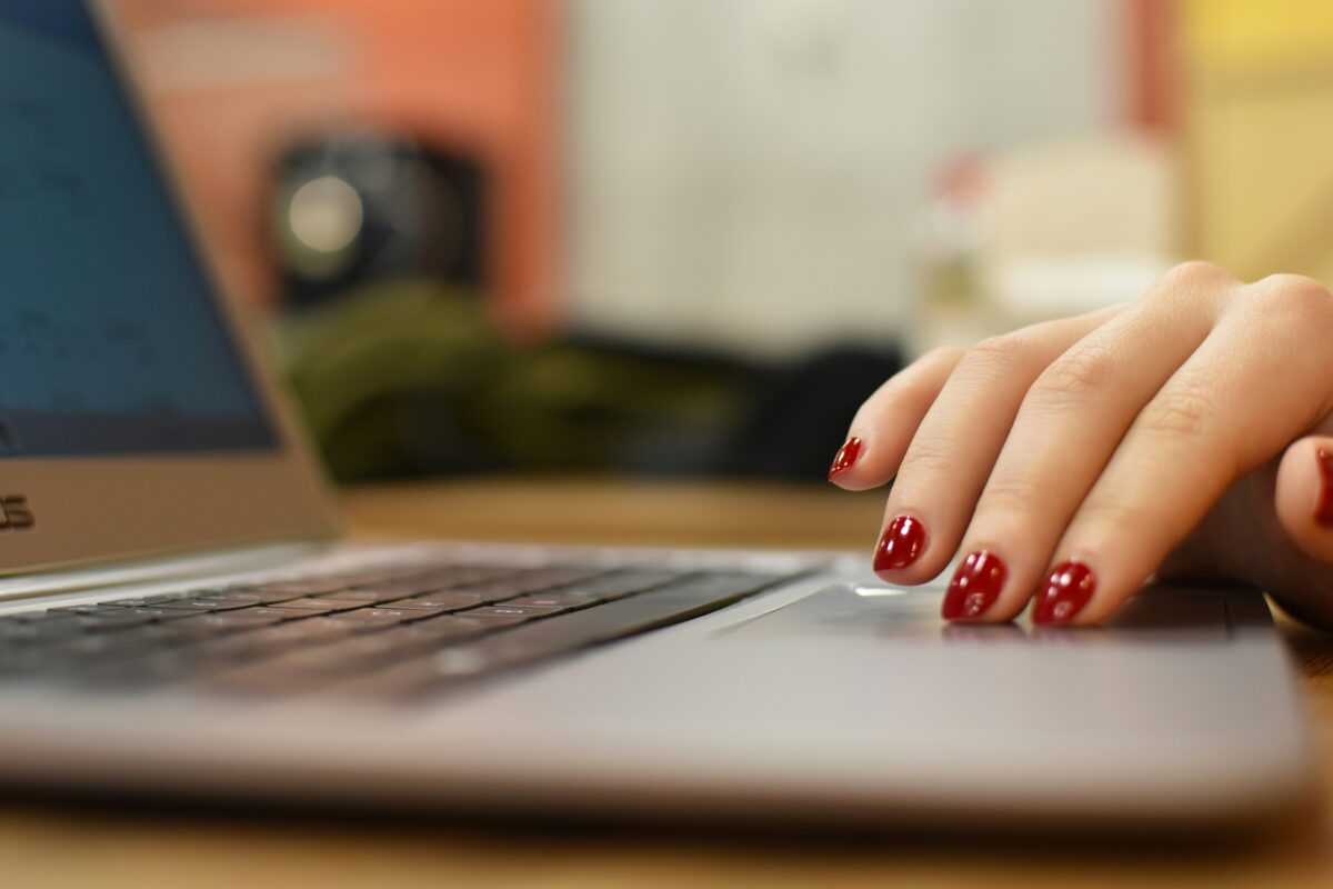 woman searching on laptop